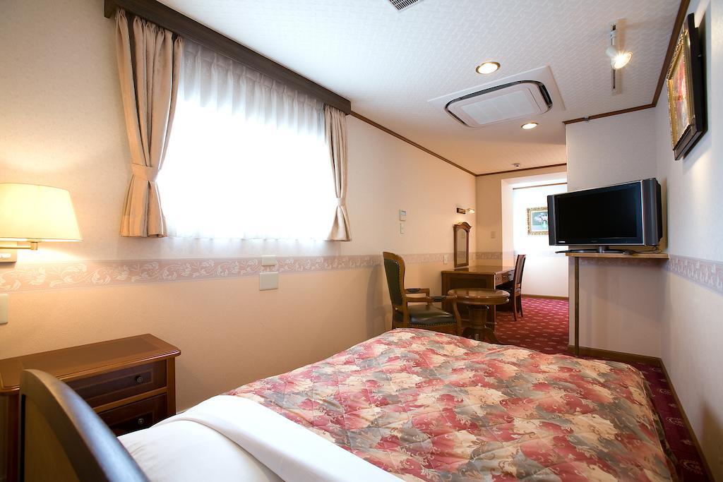Beppu Station Hotel Habitación foto