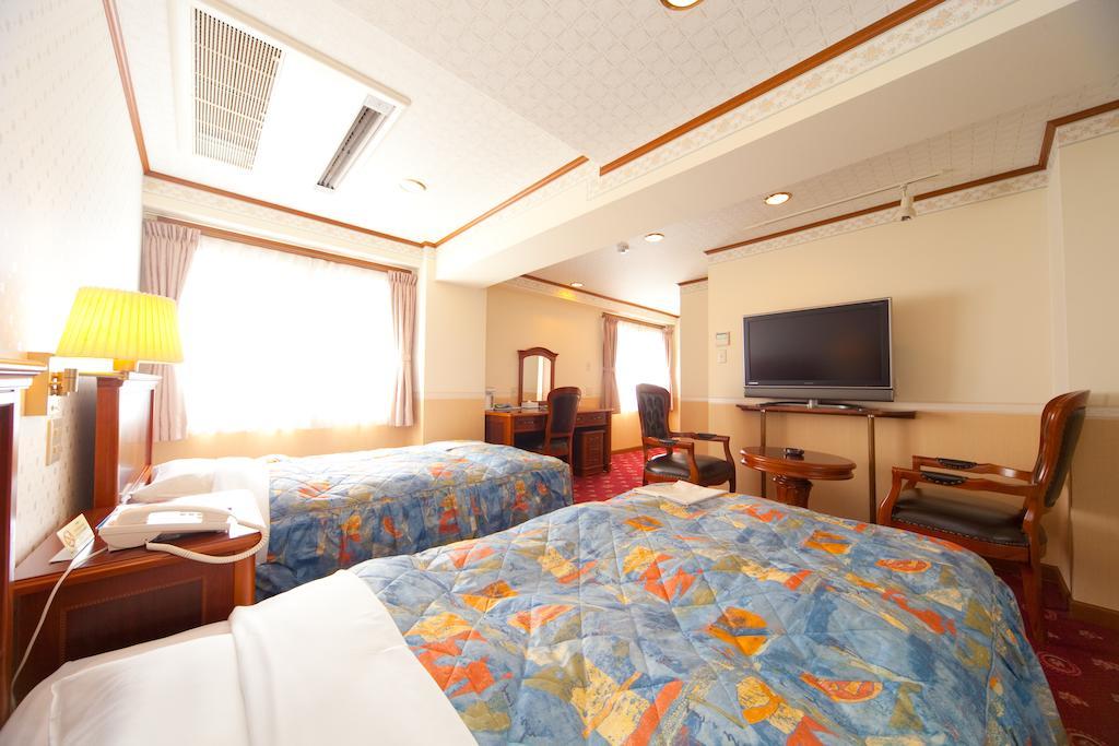 Beppu Station Hotel Habitación foto