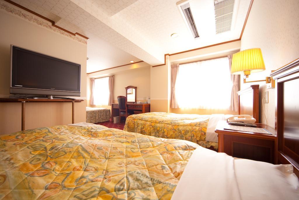 Beppu Station Hotel Habitación foto